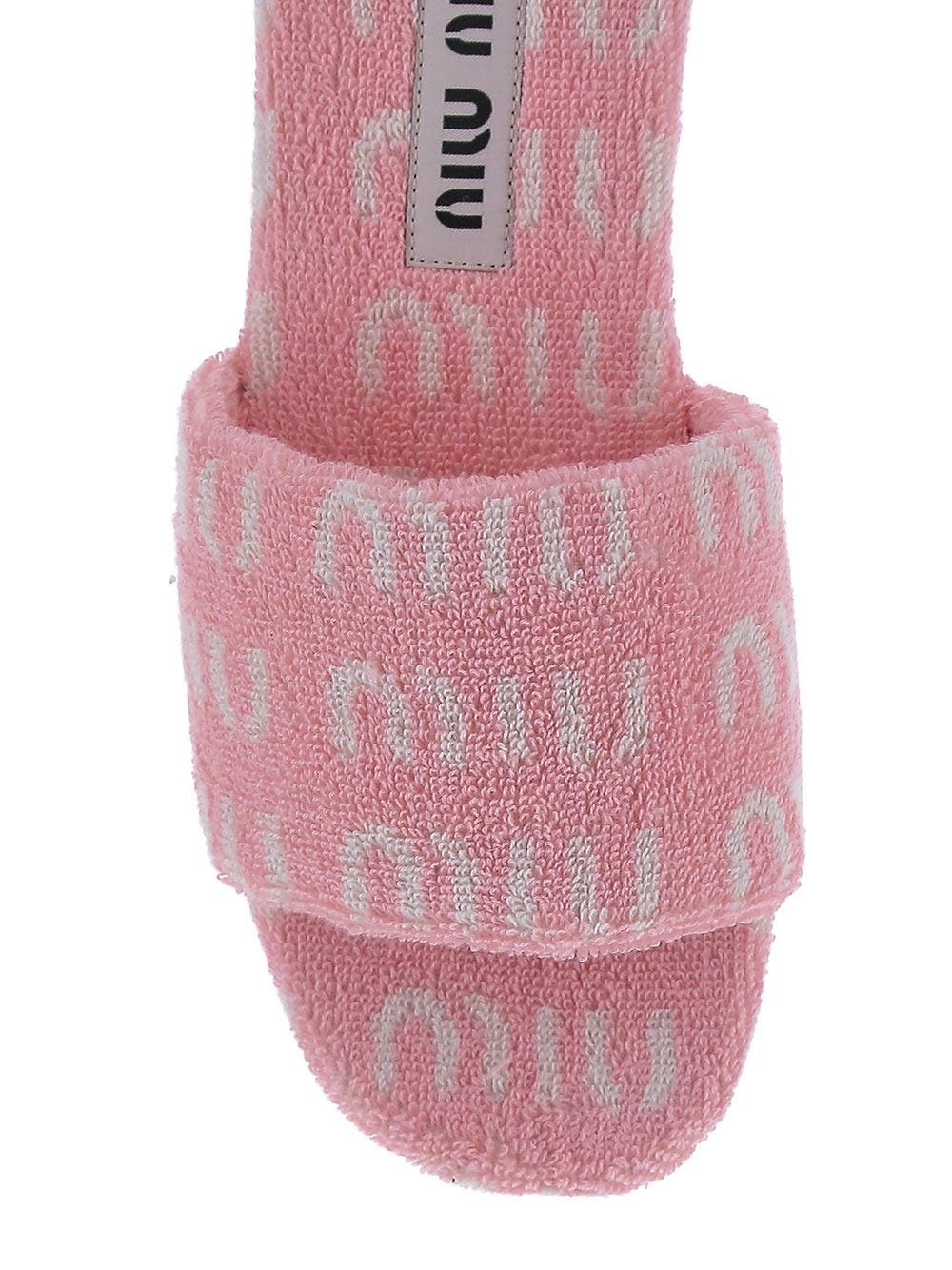 サンダル・ミュール MIU MIU LOGO FLAT SANDALS Miu Miu logo-lettering Sandals | Neutrals | FARFETCH