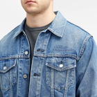Uniform Experiment Men's Denim Trucker Jacket in Indigo