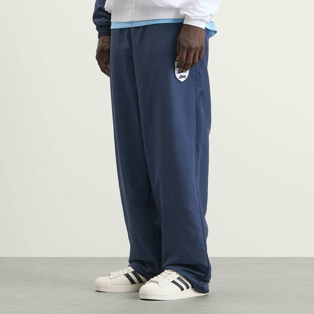ICECREAM Men's Running Dog Patch Football Track Pants in Navy