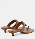 Toteme Belted croc-effect leather thong sandals