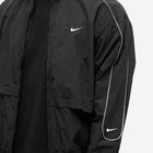 Nike Men's Solo Swoosh Woven Track Jacket in Black/White