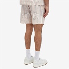 AMIRI Men's Staggered Logo Poplin Shorts in Cream Tan