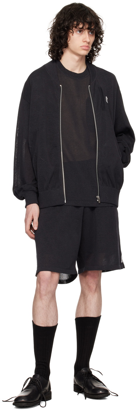 the Shepherd UNDERCOVER Black Appliqué Bomber Jacket