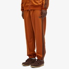 Needles Men's Poly Smooth Zipped Track Pants in Rust