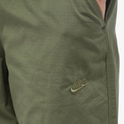 Nike Men's Teck Pack Woven Pant in Medium Olive