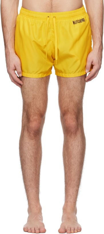 Photo: Moschino Yellow Smile Swim Shorts