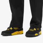 Air Jordan Men's 4 Retro Sneakers in Black/Tour Yellow