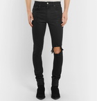 AMIRI - Skinny-Fit Distressed Waxed Stretch-Denim Jeans - Men - Black