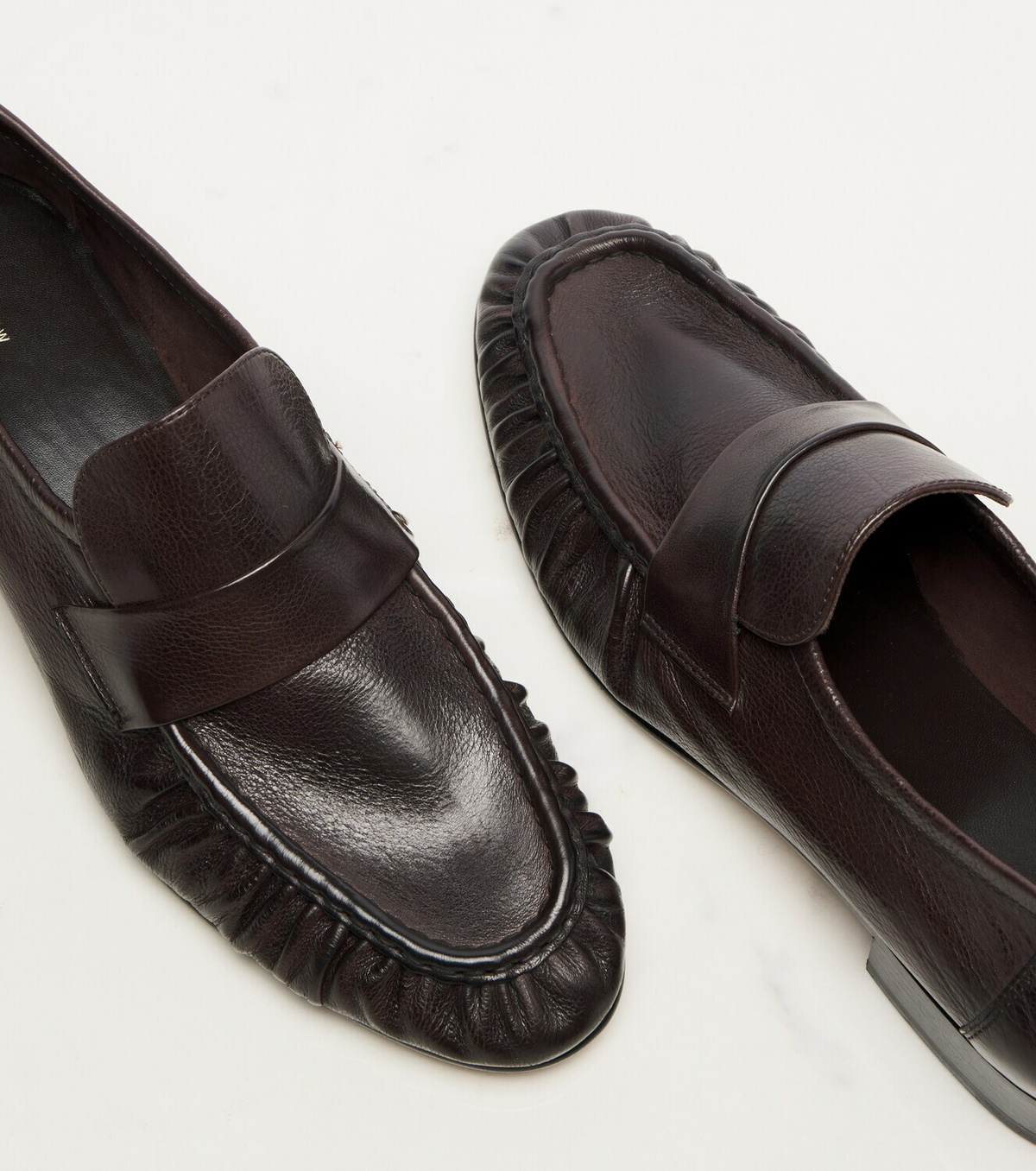 The Row Soft ruched leather loafers