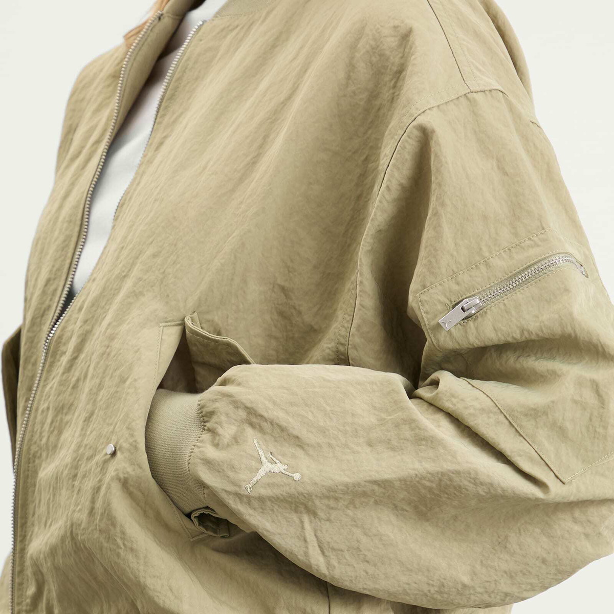 Air Jordan Women's Flight Renegade Jacket in Medium Khaki/Team Orange