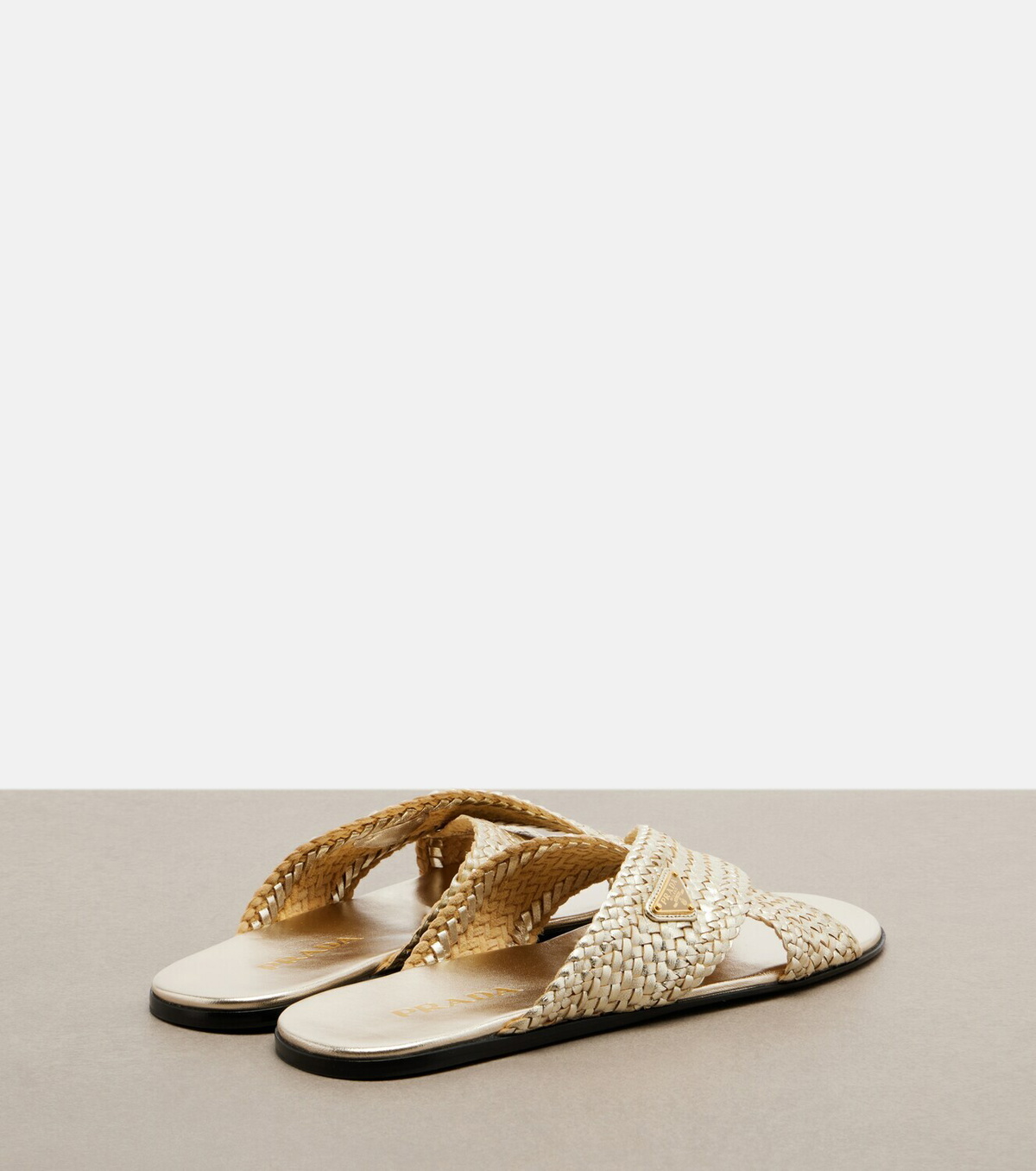 Prada Woven leather slides