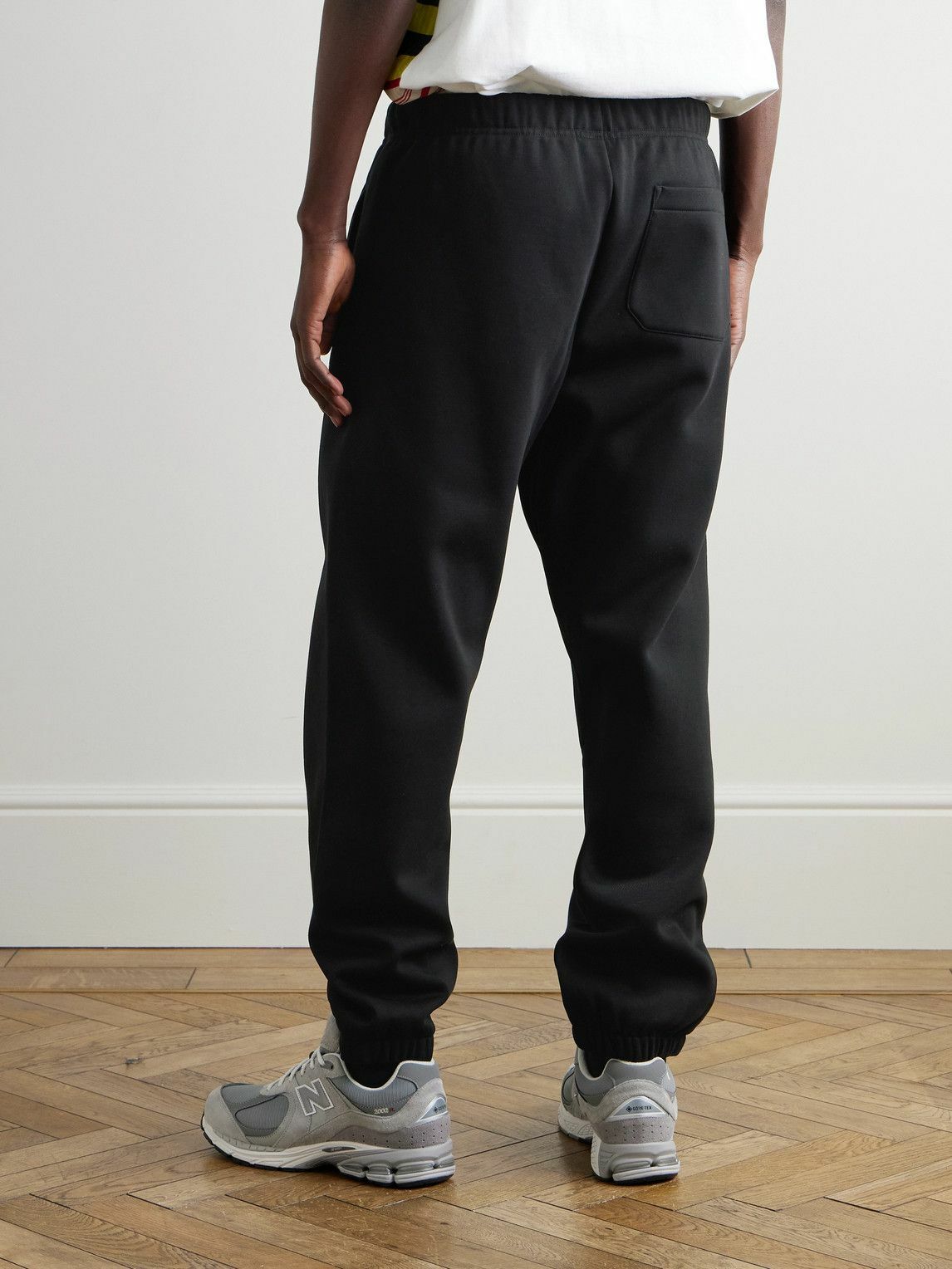 Carhartt WIP - Chase Tapered Logo-Embroidered Cotton-Blend Jersey Sweatpants - Black
