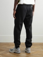 Carhartt WIP - Chase Tapered Logo-Embroidered Cotton-Blend Jersey Sweatpants - Black