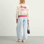 SUNDAYFRUITMARKET Women's Berry Farm Varsity Jacket in Ivory