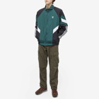 Adidas Men's Rekive Woven Track Top in Mineral Green