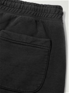 SAINT Mxxxxxx - Angel of Death Tapered Logo-Print Cotton-Jersey Sweatpants - Black