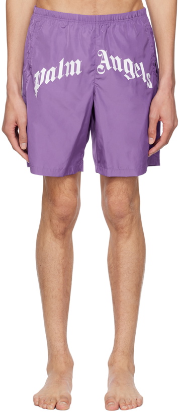 Photo: Palm Angels Purple Curved Swim Shorts