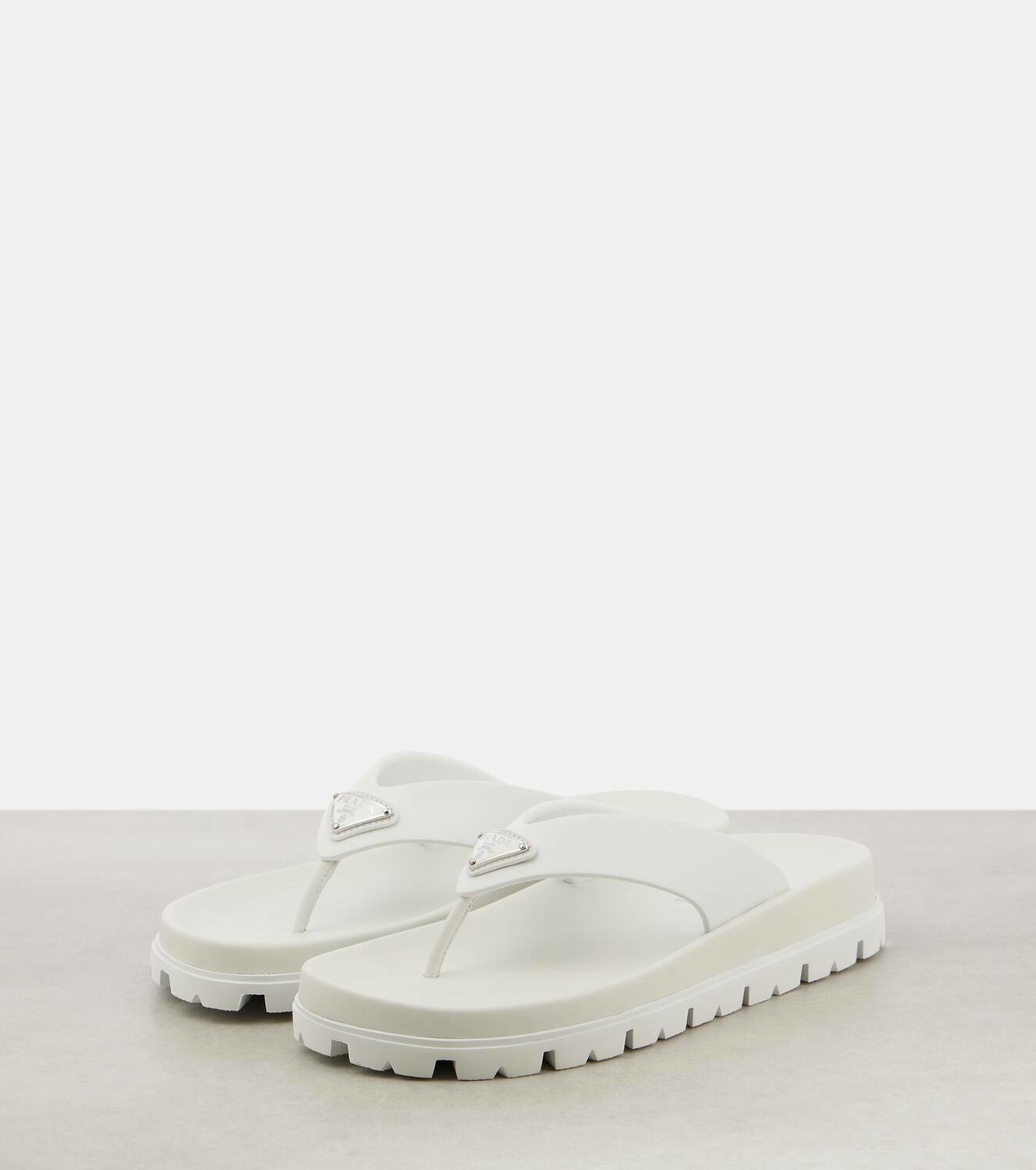 Prada Leather-trimmed thong sandals