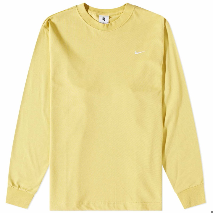 Photo: Nike Men's Long Sleeve Solo Swoosh T-Shirt in Saturn Gold/White
