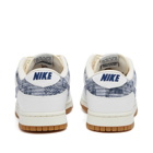 Nike Men's Dunk Low Sneakers in White/Midnight Navy