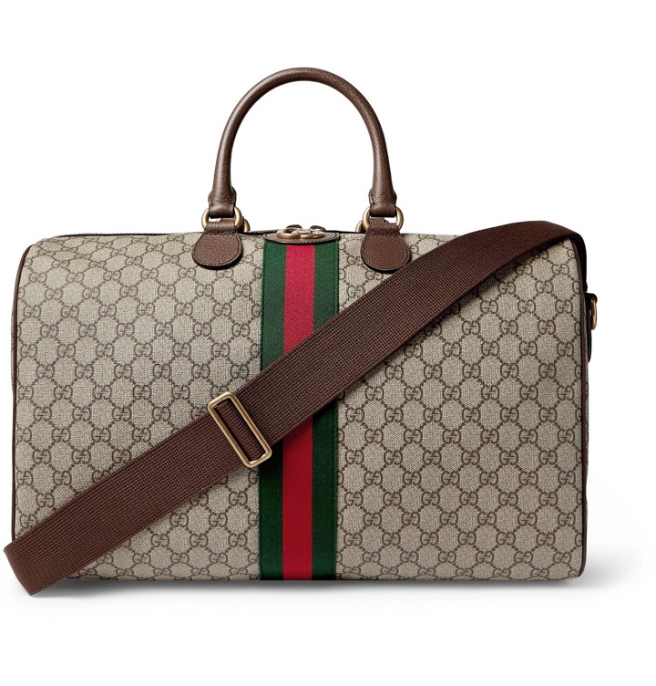 Photo: GUCCI - Ophidia Leather and Webbing-Trimmed Monogrammed Coated-Canvas Duffle Bag - Brown