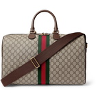 GUCCI - Ophidia Leather and Webbing-Trimmed Monogrammed Coated-Canvas Duffle Bag - Brown