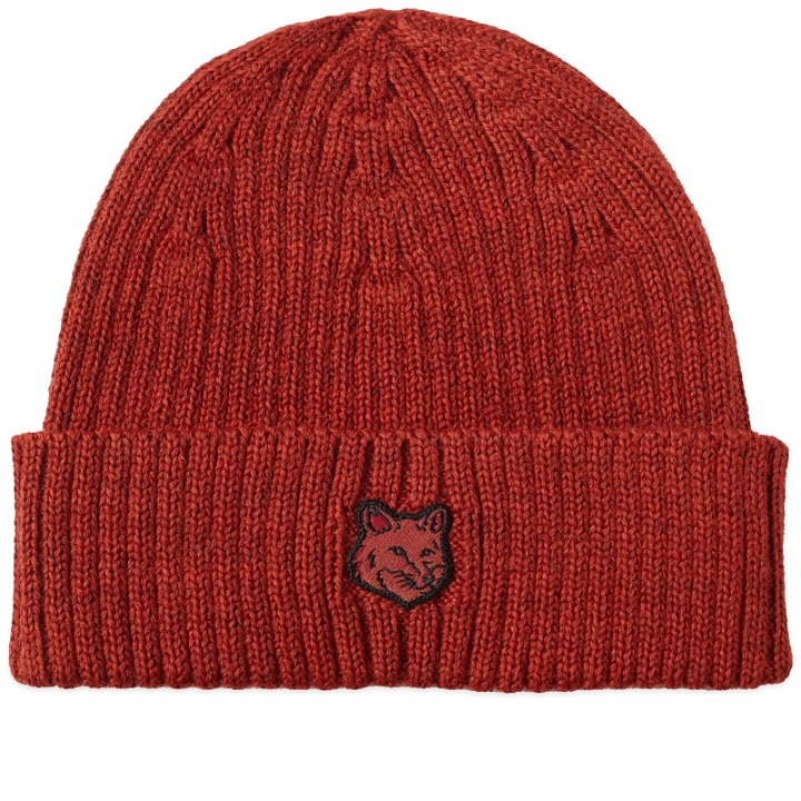 Photo: Maison Kitsuné Men's Fox Head Patch Ribbed Beanie in Burnt Red