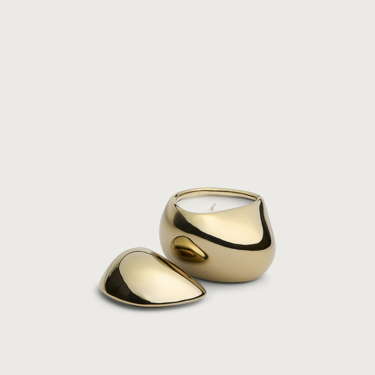 ferm LIVING Bellure Scented Candle in Brass Finish