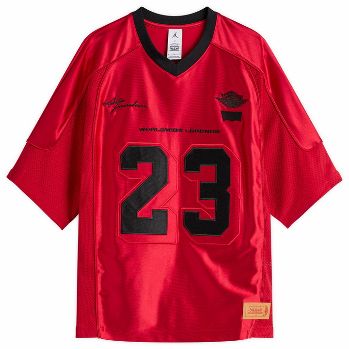Photo: Air Jordan Men's x Levi's Jersey Top in Gym Red/Black/Pale Ivory/Black