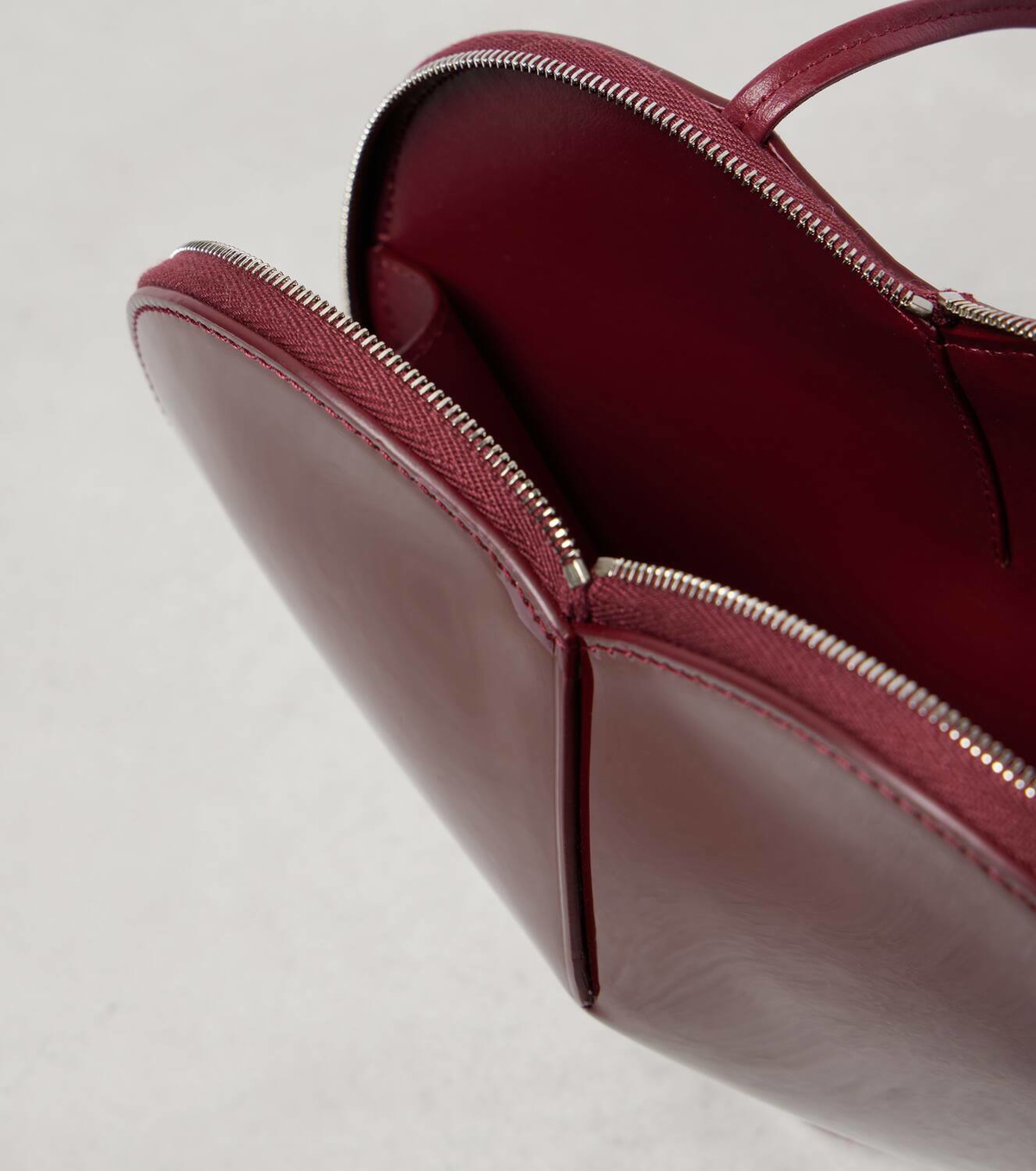 Alaïa Le Cœur patent leather shoulder bag ALAÏA