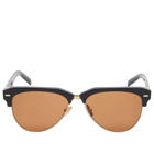Miu Miu Eyewear Women's 09ZS Sunglasses in Black/Brown 