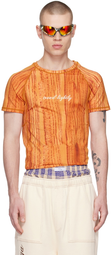 Photo: Raga Malak Orange 'Tread Lightly' T-Shirt