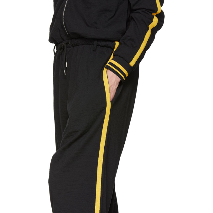 Black pants with outlet yellow stripe