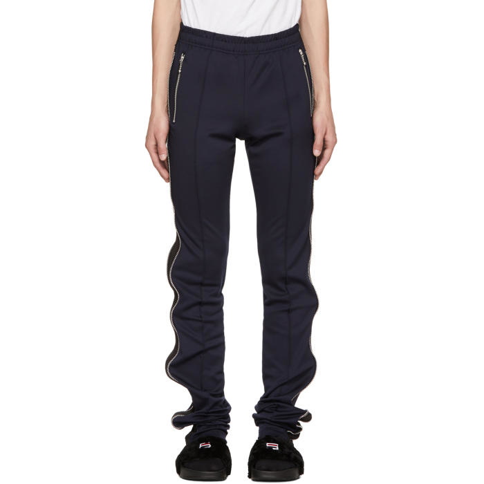 Photo: 99% IS Navy and Black Super Long Zip Track Pants