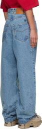 VETEMENTS Blue Passport Stamps Jeans