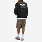 Drôle de Monsieur Men's Slogan Coach Jacket in Black