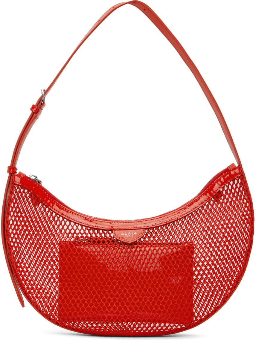 【関税込み】ALAIA オレンジ One Piece Demi Lune バッグ ALAÏA: Orange One Piece Demi Lune Bag | SSENSE
