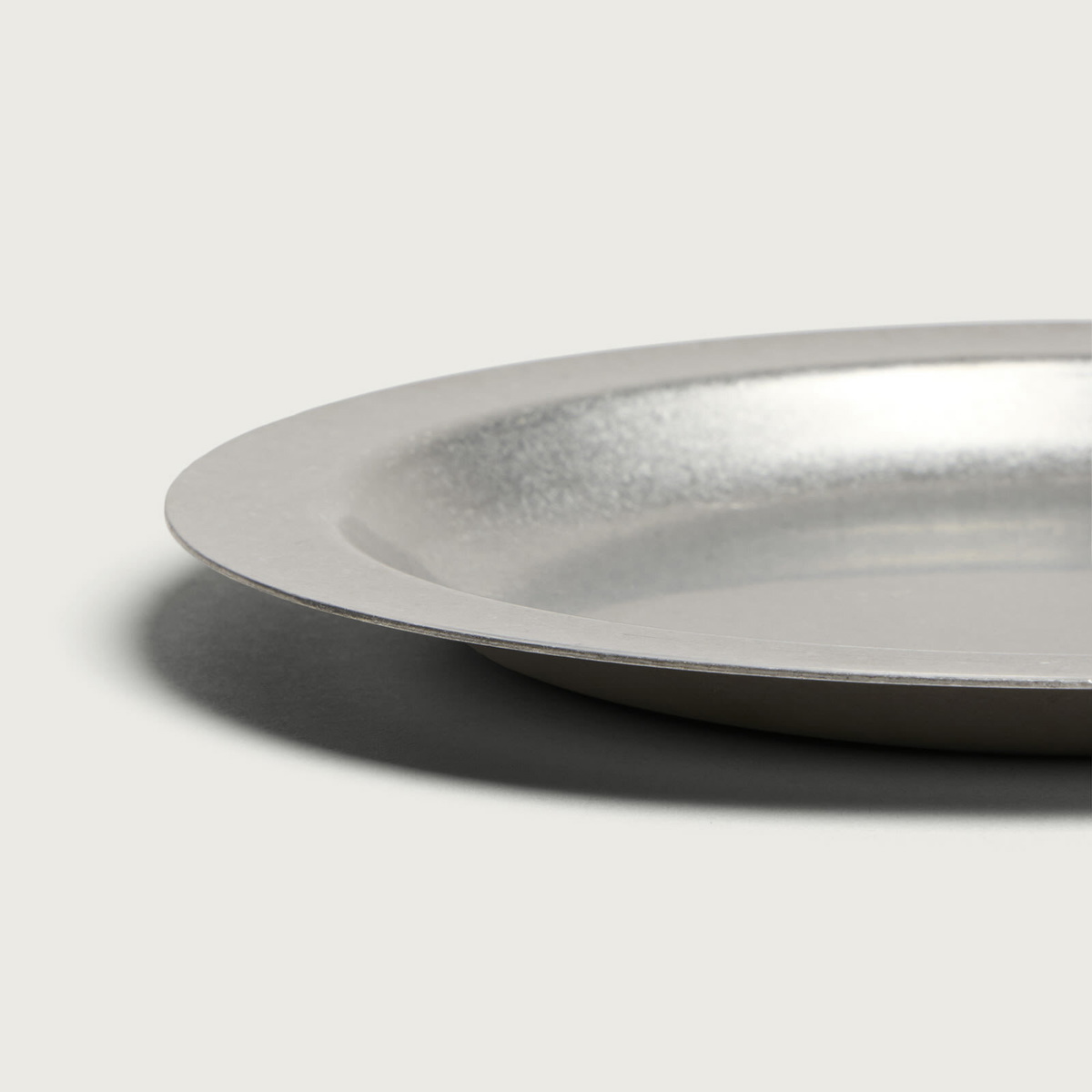 ferm LIVING Tumbled Plate in Stainless Steel
