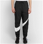 Nike - Tapered Logo-Print Nylon Track Pants - Men - Black