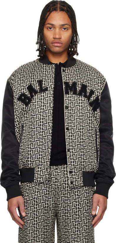 Photo: Balmain Black & Off-White Monogrammed Varsity Jacket