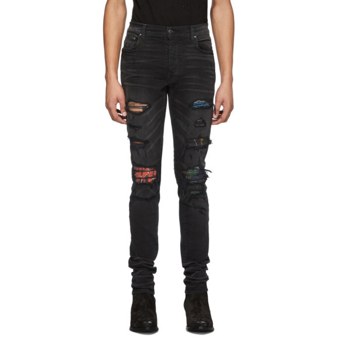 Photo: Amiri Black Vintage Tee Animation MX1 Jeans