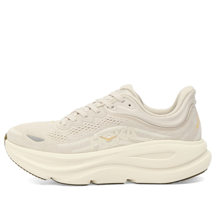 Photo: Hoka One One Women's Bondi 9 Sneaker in River Rock Grey/Alabaster