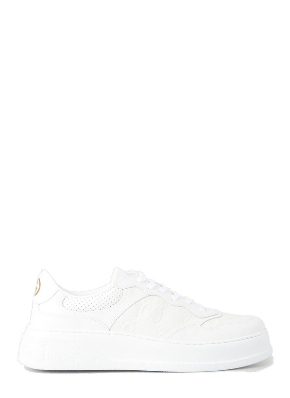 Photo: GG Embossed Sneakers in White