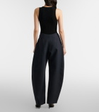 Alaïa Round wool crepe barrel-leg pants