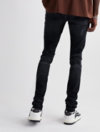 AMIRI - Thrasher Skinny-Fit Distressed Panelled Jeans - Black