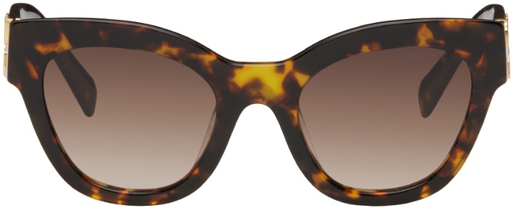 Photo: Miu Miu Eyewear Brown Cat-Eye Sunglasses
