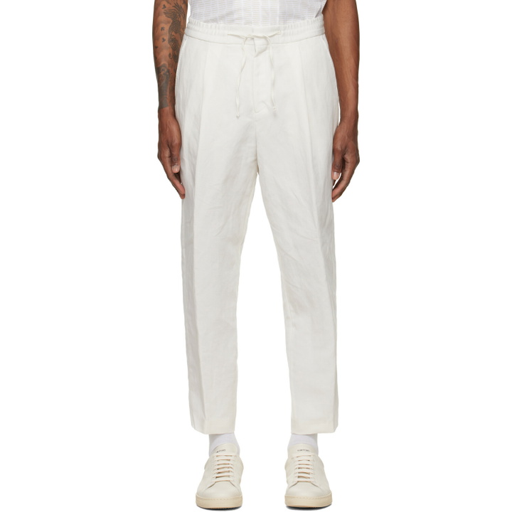 Photo: BOSS Off-White Pleated Trousers