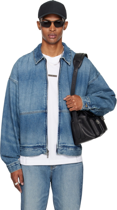 Photo: Fear of God ESSENTIALS Blue Denim Trucker Jacket