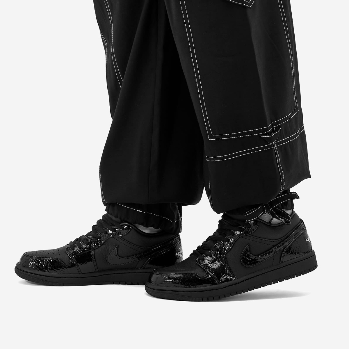 Air Jordan Women's 1 Low SE GJ W Sneaker in Black/White/Silver