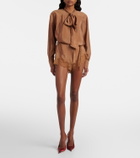 Saint Laurent Lace-trimmed tie-neck romper